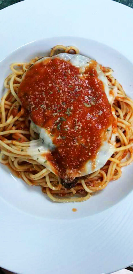 chicken parmesan over pasta